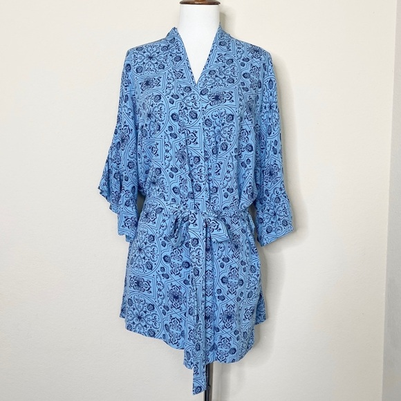 Ruby Ribbon Ruffle Wrap Blue Floral Top - Picture 3 of 13